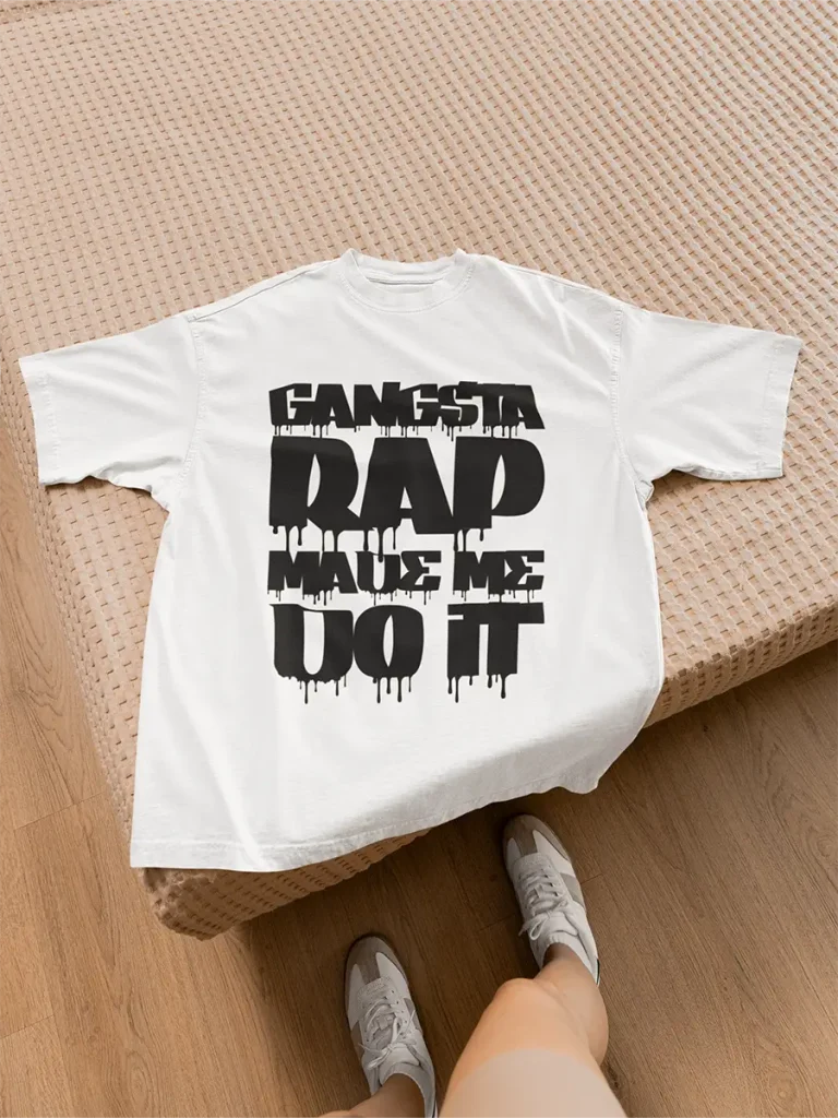 Close-up of a t-shirt that reads “Gangsta Rap Made Me Do It” in stylized font