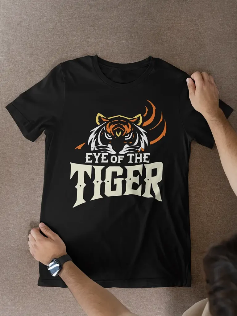 A t-shirt with a graphic print showing a tiger and words Eye of the Tiger